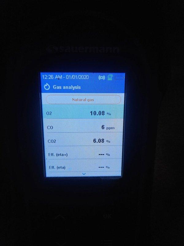 Performed comprehensive diagnostic evaluation of existing HVAC system and domestic water heater in preparation for system replacement. Inspected 2009 Rheem 40-gallon natural gas water heater showing significant condensation on exterior tank surface, indicating possible insulation failure or temperature/pressure relief concerns. Conducted combustion analysis on gas-fired equipment revealing elevated oxygen levels at 10.08% and suboptimal CO2 readings at 6.08%, suggesting improper air-to-fuel ratio and inefficient combustion. Carbon monoxide levels measured at 6 ppm, within acceptable range but indicating system requires adjustment. Documented equipment conditions via photography for replacement specifications. Provided findings to support new system installation planning.
