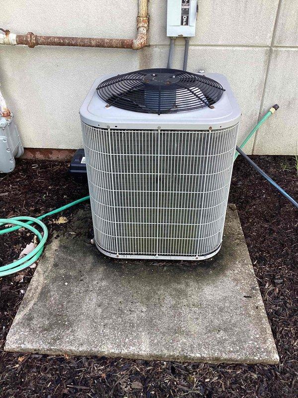 Completed spring maintenance on commercial outdoor air conditioning condenser unit. Performed comprehensive system inspection including visual assessment of refrigerant lines, electrical connections, and overall equipment condition. Unit operational and ready for cooling season, with copper piping showing normal weathering consistent with outdoor installation age.