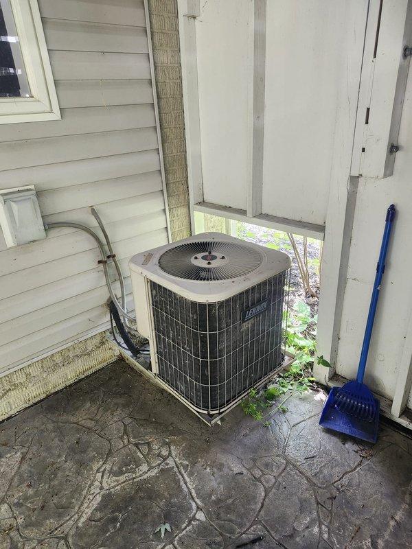 Completed full HVAC system retrofit including furnace and air conditioning installation. Installed new air handler in attic space with flexible ductwork, refrigerant lines, and electrical connections, properly insulated per code requirements. Positioned new outdoor condensing unit on concrete pad with refrigerant line set routed along exterior wall and connected to indoor equipment.