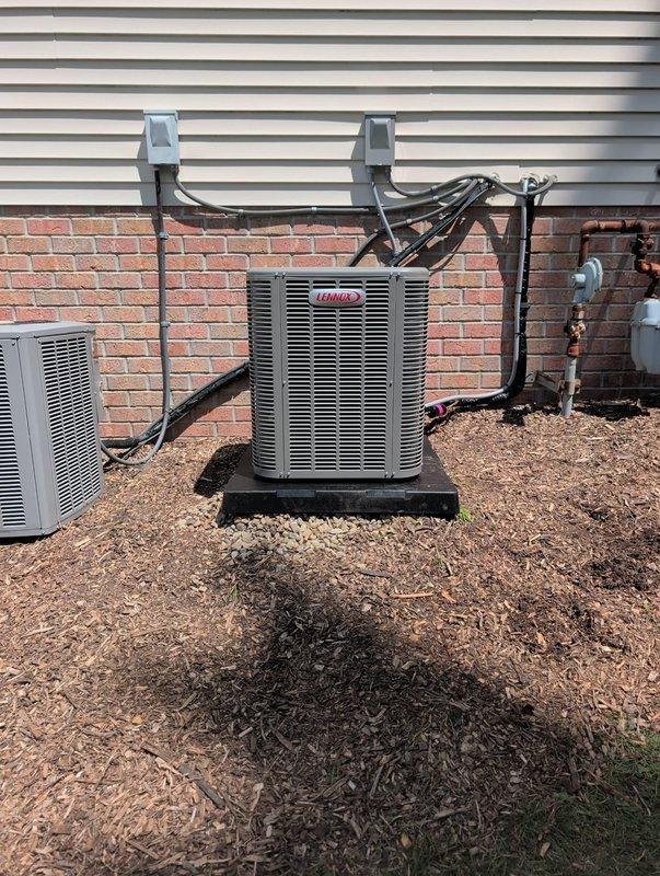 Completed full HVAC system retrofit including installation of new Lennox furnace in basement mechanical room and matching Lennox condenser unit on exterior pad. Installed new refrigerant line set with proper insulation, routed lines through wall penetration with appropriate sealing, and secured all piping with manufacturer-approved mounting brackets to vinyl siding. Connected PVC venting system for high-efficiency furnace exhaust and intake, installed electrical disconnects and conduit runs for both indoor and outdoor units, and verified all ductwork connections. System tested for proper operation, refrigerant charge confirmed to manufacturer specifications, and all safety controls verified functional.