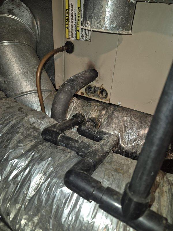 Completed scheduled maintenance on residential air conditioning system over 10 years old. Performed standard tune-up procedures including inspection of HVAC unit, ductwork, and refrigerant lines in attic space. Identified condensate drain line requiring replacement and documented condition with photos for customer review and future service planning.