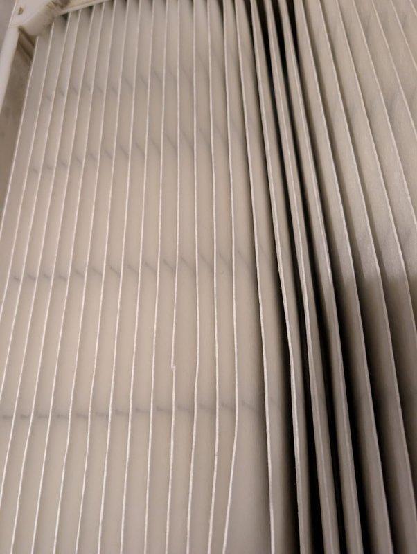 Completed routine air conditioning tune-up and preventative maintenance service. Inspected system components, checked refrigerant levels, and tested operational performance. Evaluated and documented air filter condition, noting accumulation of dust and debris; filter shows signs of normal usage and will require replacement at next service interval to maintain optimal system efficiency and indoor air quality.