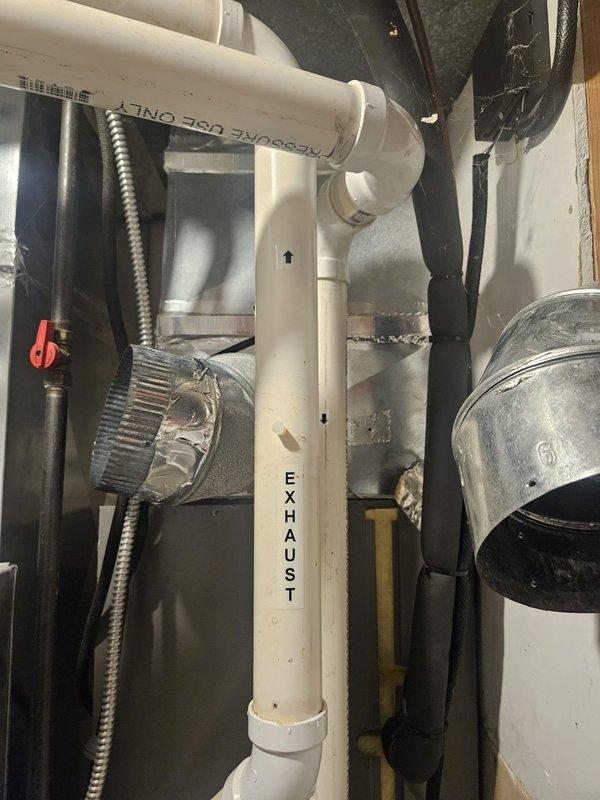 Responded to service call for temperature control issue reported by building management. Upon arrival, performed system diagnostic on Lennox furnace installation. Inspected exhaust and intake PVC venting, verified proper labeling and connections, checked expansion tank operation, and examined all ductwork connections. System found operating within normal parameters with no immediate mechanical failures detected.
