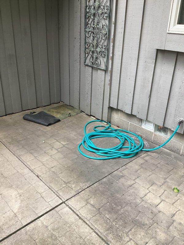 Provided quote for replacement of 13-year-old natural gas tanked water heater showing visible rust deterioration at base unit. Assessed existing equipment condition and discussed replacement options with property owner for scheduling installation after 12pm.