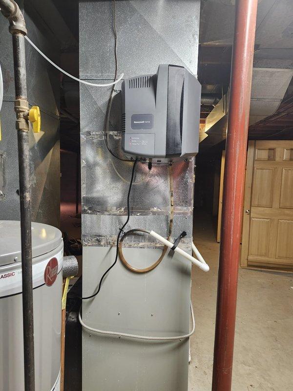 Completed replacement of two residential air conditioning systems. Removed existing outdoor condenser units and installed new equipment on concrete pads against exterior wall. Installed new evaporator coil in basement utility area with proper integration into existing ductwork system. Ran new refrigerant line sets from outdoor units to indoor coil, ensuring proper insulation and secure mounting. Connected electrical wiring and verified proper power supply to all components. Tested system operation, confirmed proper refrigerant charge levels, and verified adequate airflow through both systems. All equipment functioning within manufacturer specifications upon completion.
