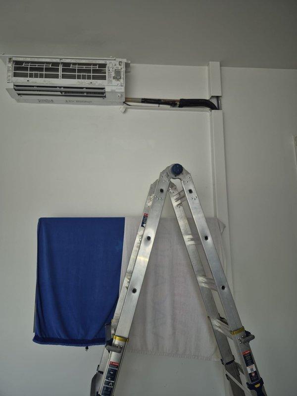 Responded to no cool call on 10-month-old mini split system requiring manual resets to operate. Performed diagnostic evaluation of indoor air handler and reviewed system operation. Upon inspection, determined the intermittent operation issue was unrelated to the recent installation and advised customer of chargeable service nature. Accessed indoor unit for thorough examination of electrical connections, control board functionality, and filter condition to identify root cause of manual reset requirement.