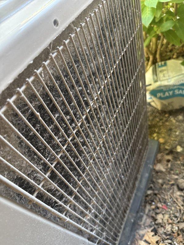 Performed seasonal tune-up on residential air conditioning system, including system diagnostics with digital manifold gauges showing refrigerant pressures and temperatures within acceptable ranges. Identified heavily soiled condenser coil with significant dirt and debris accumulation restricting airflow, requiring thorough cleaning for optimal heat transfer efficiency. Customer reported concerns regarding zoning system operation that will require follow-up evaluation by technician with advanced zoning system expertise.