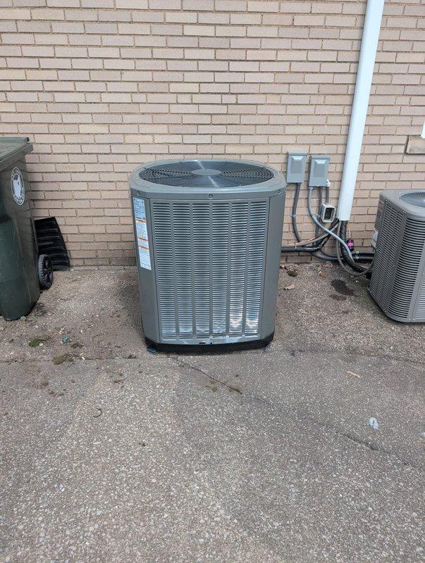 Completed commercial air conditioning and coil replacement at the facility. Removed existing HVAC equipment and installed new Carrier air handler unit in interior mechanical room with proper refrigerant line connections, PVC condensate drainage system, and electrical disconnect. Installed new outdoor condenser unit against exterior brick wall with appropriate electrical connections and refrigerant line set. All components were properly secured, insulated, and tested for operational performance per manufacturer specifications.