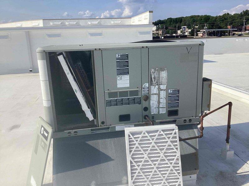 Performed filter replacement on commercial rooftop package HVAC unit. Customer-supplied 16x20 pleated air filter was installed in the unit housing, with filter properly seated and access panel secured upon completion.