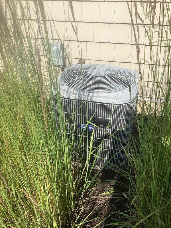 Completed routine maintenance on a 10+ year old residential Carrier cooling system. Performed standard inspection of indoor furnace unit and outdoor condenser, checked all electrical connections, verified proper operation of compressor and fan motor, and ensured condensate drain lines were clear and functioning properly.