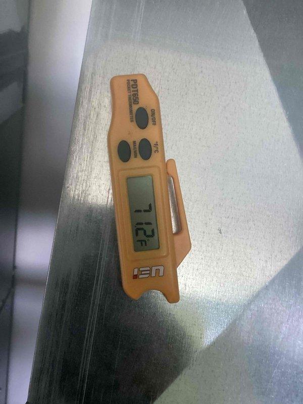 Completed routine maintenance on 2-year-old Trane XTi residential air conditioning system. Performed standard cooling season inspection including temperature verification at 73°F, examined outdoor condenser unit condition, and confirmed proper system operation. Unit found in good working order with no deficiencies noted.
