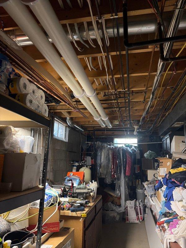 Completed full furnace and evaporator coil replacement in residential basement location. Removed existing equipment and installed new high-efficiency furnace unit with proper venting system utilizing white PVC intake and exhaust pipes secured with metal strapping. Connected flexible metal ductwork to furnace outlet and verified all connections were properly sealed. Installation includes proper clearances, secure mounting on concrete pad, and compliance with manufacturer specifications and local code requirements.