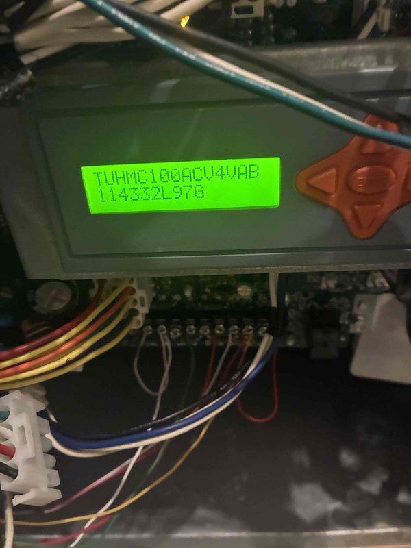 Responded to emergency no-start condition following tripped breaker. Upon inspection, diagnosed failed control board with visible component damage on PCB. Inspected circuit board assembly, toroidal inductors, capacitors, and integrated circuits within control cabinet. Verified system would not initialize after breaker reset due to control board failure. Documented control board serial number APPBS2003681 and LCD display error code for equipment records and recommended complete control board replacement to restore system operation.