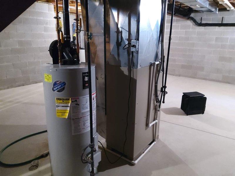 Completed comprehensive estimate for full HVAC system replacement in residential basement installation. Assessed existing furnace and air conditioning equipment configuration, evaluated current ductwork infrastructure including main trunk line, and documented mechanical room layout with water heater proximity. Provided detailed replacement specifications for new high-efficiency heating and cooling system retrofit to upgrade aging equipment while maintaining existing duct distribution network.