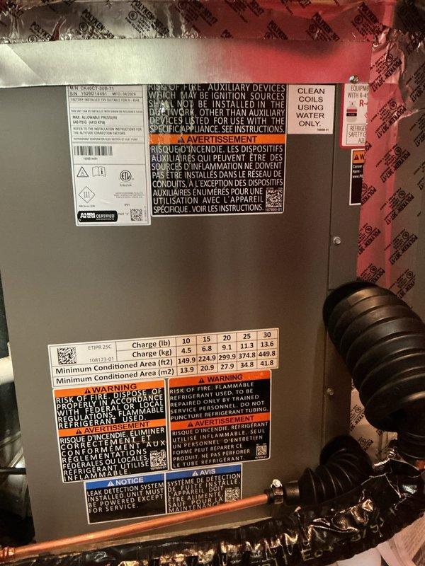 Completed AC retrofit installation in residential utility closet, replacing existing air conditioning system and evaporator coil. Installed new air handler unit with matching evaporator coil in vertical stack configuration above existing furnace. Connected refrigerant lines using copper piping, installed new flex ductwork, and verified all electrical connections to manufacturer specifications. System properly charged with refrigerant according to unit specifications, tested for proper airflow and cooling operation, and confirmed all safety controls functioning correctly.