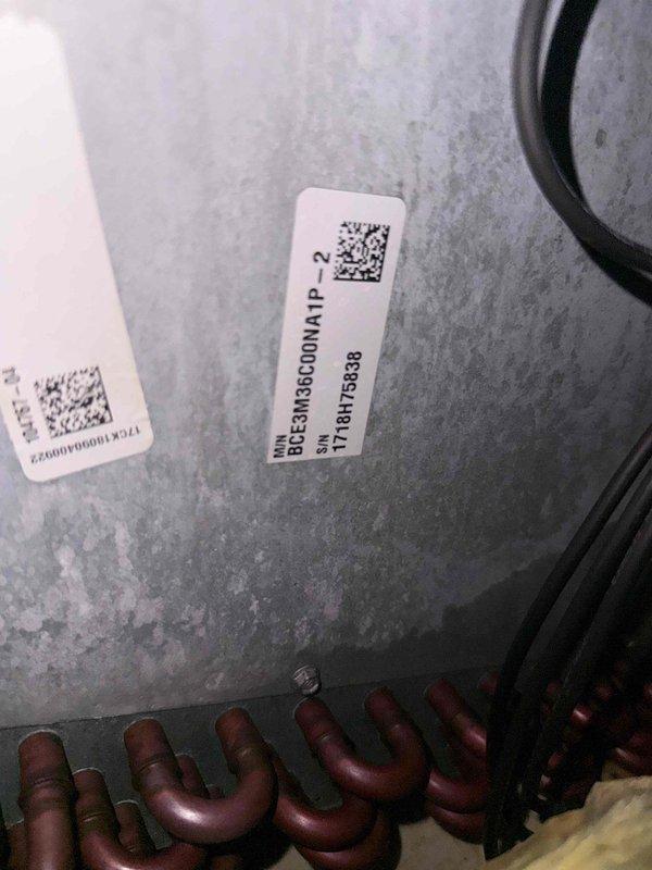 Responded to no cooling complaint on R-410A system. Upon arrival, connected digital manifold gauges to assess system performance. Found low side pressure at 133.9 psig and high side pressure at 319.9 psig with superheat reading of 13.9°F and subcooling at 3.0°F, below target of 3°F. Documented equipment model BDCSM3GC00A1P_2 serial number 1718H76B8B8 and refrigerant line set configuration. System operating parameters indicate insufficient subcooling requiring further refrigerant charge adjustment to restore proper cooling capacity.