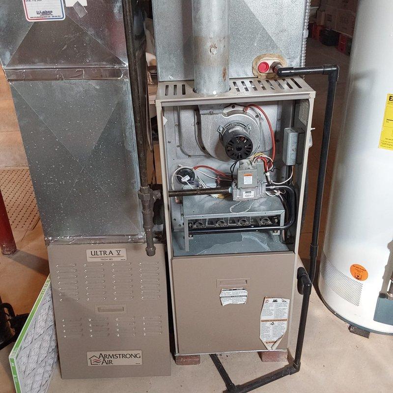 Provided comprehensive estimate for complete HVAC system replacement including both air conditioning unit and gas furnace, as existing 22-year-old equipment has reached end of service life. Previous service call addressed refrigerant loss with recharge, but system subsequently experienced evaporator coil freeze-up, indicating underlying issues consistent with aging equipment that warrants full system replacement rather than continued repairs.