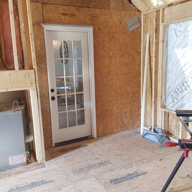 Completed estimate for mini-split installation in new addition space currently under construction. Assessed electrical panel capacity and available breaker spaces for dedicated circuit requirements, evaluated optimal indoor unit placement within OSB-framed room with exterior door access, and determined outdoor condenser location and line set routing path. Provided comprehensive proposal for equipment sizing, electrical modifications, and installation scope to condition the newly constructed space.