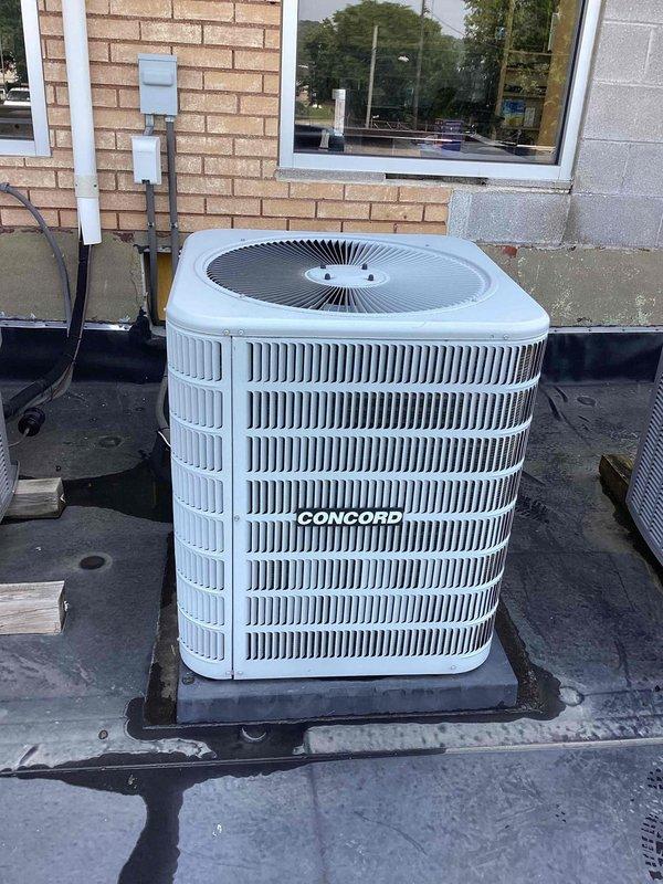 Completed scheduled commercial cooling maintenance visit. Inspected rooftop Concord condensing unit and indoor Armstrong furnace system with associated air handler components. Verified proper operation of all equipment, checked refrigerant levels, examined electrical connections and disconnect boxes, and assessed overall system performance. All components found to be in functional condition with no immediate service needs identified. Routine preventive maintenance performed per contract specifications.