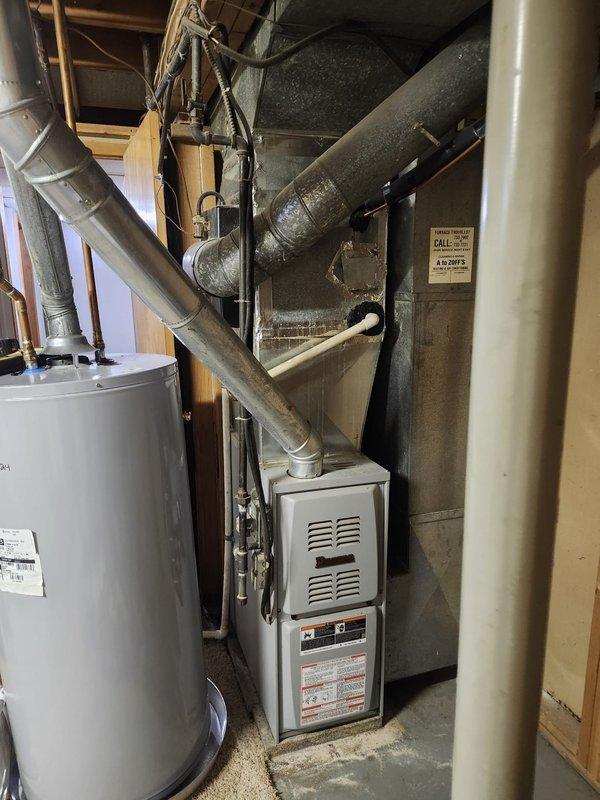 Completed full HVAC system retrofit in residential basement, removing existing furnace and air conditioning equipment and installing new complete heating and cooling system. Installation included new furnace unit with proper venting, ductwork connections to existing distribution system, gas line connections, electrical hookup, and condensate drain routing. Verified all connections for proper airflow, tested system operation through complete heating and cooling cycles, and confirmed equipment is functioning within manufacturer specifications.
