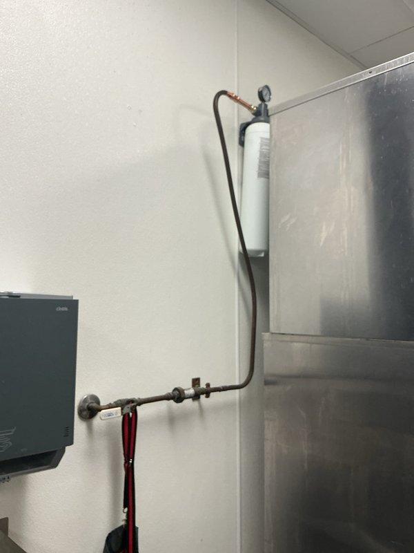 Responded to a leaking ice maker supply line. Installed new copper piping with proper fittings and connections, including a shut-off valve and water filter assembly with pressure gauge. Pressure tested the entire system to verify integrity of all connections and ensure no leaks were present before restoring water service.