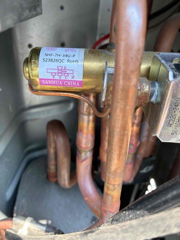 Responded to no cooling complaint on ductless mini-split system. Upon inspection, examined indoor wall-mounted evaporator unit and outdoor condensing unit components including electronic expansion valve and refrigerant lines. System evaluated and restored to proper cooling operation with unit displaying 60°F setpoint.