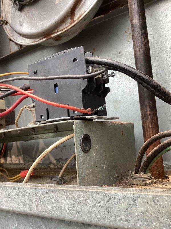 Responded to service call for non-operational commercial rooftop A/C unit. Upon arrival, found unit severely dislodged from curb mount at approximately 45-degree angle, likely due to storm damage or structural failure. Assessed electrical connections and refrigerant lines for damage, documented equipment displacement with photographs. Unit requires professional rigging equipment to safely reposition and secure to mounting curb, along with complete electrical and refrigerant system integrity testing before restoration to service.