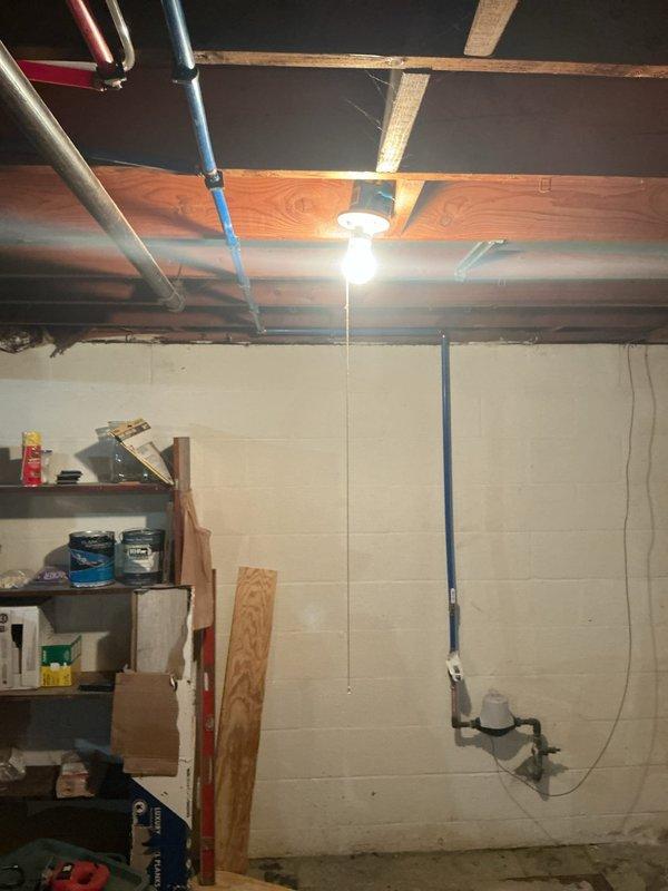 Responded to service call for water pressure adjustment and potential kitchen sink leak evaluation. Inspected plumbing system infrastructure including PEX piping, water heater connections, and supply lines in mechanical room. Assessed water pressure settings and documented existing plumbing configuration for follow-up diagnostic work on reported kitchen sink leak.