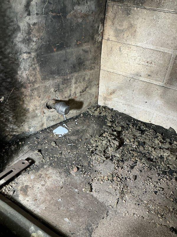 Conducted site assessment of existing gas line servicing outdoor grill connection in basement utility area. Inspected exposed gas piping system, identified termination point requiring cap installation, and provided pricing estimate for proper gas line abandonment per code requirements.