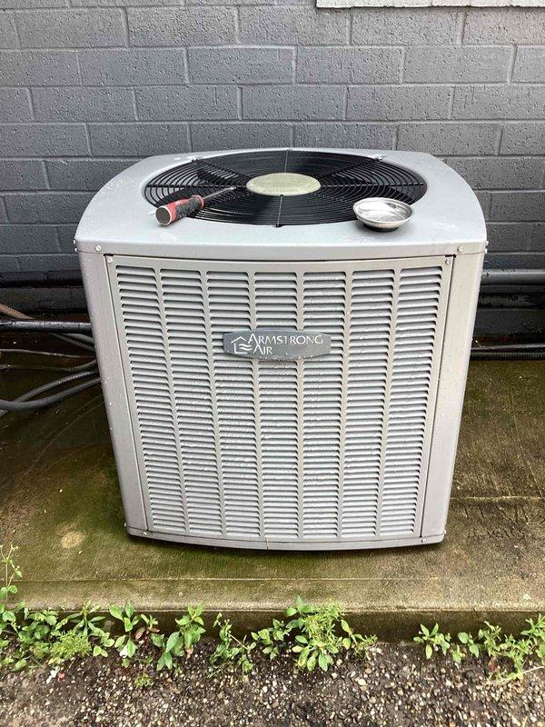 Completed spring/summer preventive maintenance on two Armstrong commercial air conditioning condenser units. Performed comprehensive system inspection including cleaning condenser coils, checking refrigerant pressures, verifying electrical connections, testing capacitors, and confirming proper fan motor operation on both units. All equipment found operating within manufacturer specifications with no immediate repairs required.