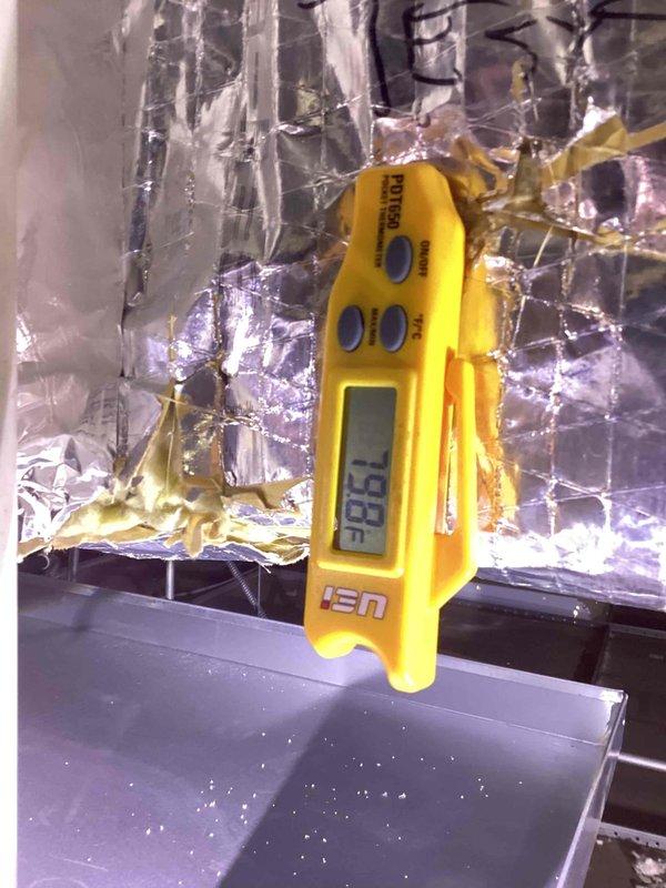 Completed spring maintenance on commercial HVAC system. Inspected and replaced dirty air filter showing significant dust and particulate accumulation. Performed temperature diagnostics using digital measuring instrument at ductwork and insulation areas to verify proper system operation and airflow efficiency.