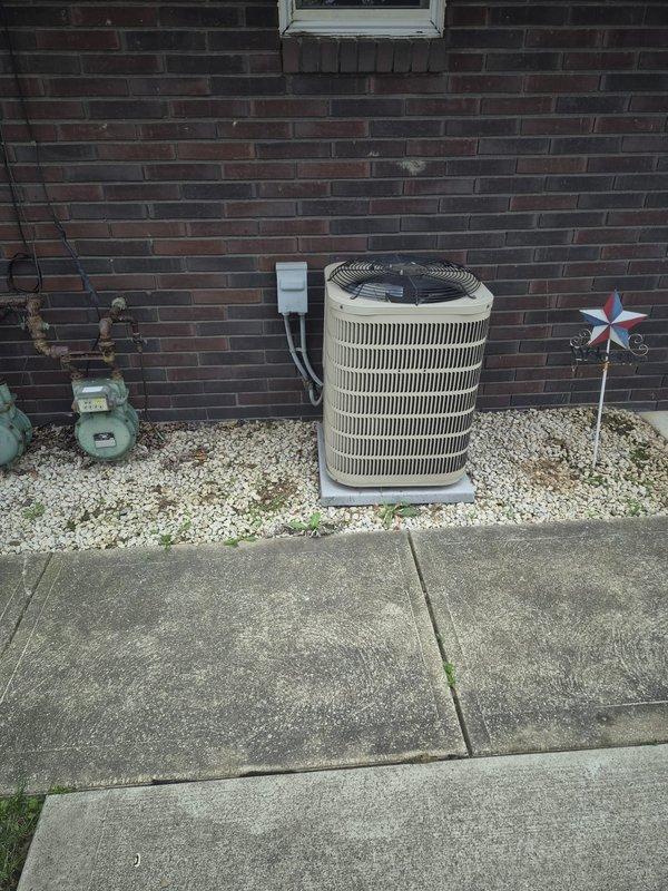 Responded to service call for air conditioning system not producing cold air. Upon arrival, performed diagnostic inspection of outdoor condenser unit and indoor air handler system. Inspected electrical connections at disconnect box, verified proper power supply to equipment, and checked refrigerant lines for leaks or restrictions. Evaluated condenser fan operation and compressor functionality. Examined indoor air handler cabinet, ductwork connections, and airflow distribution system in mechanical space. System components inspected and operational status verified to restore cooling performance.