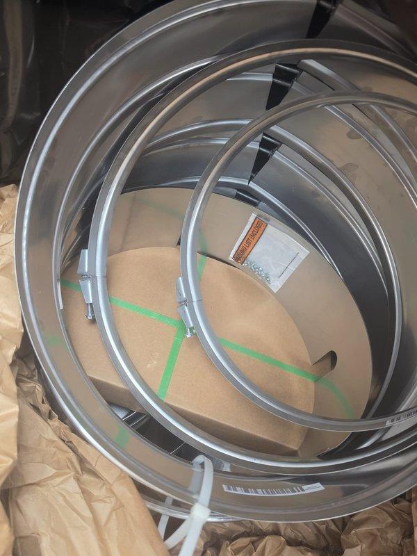 Attended bi-weekly site and safety meeting for commercial new construction project. Documented equipment delivery and staging, including packaged HVAC unit with protective wrapping on pallet and spiral ductwork components with proper labeling and securing. All materials appeared in good condition and ready for installation phase.
