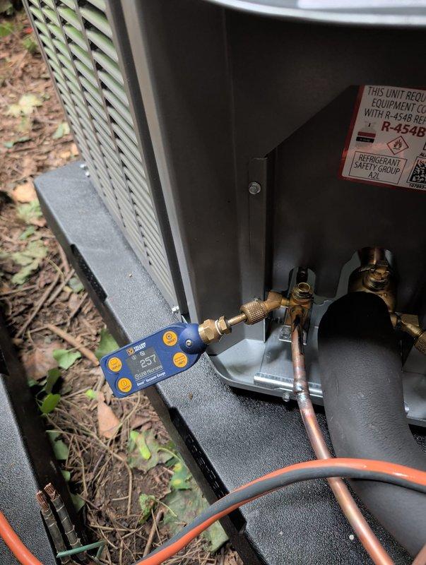 Completed installation of four complete HVAC systems including furnaces and air conditioning units for commercial application. Performed comprehensive leak testing on refrigerant systems using digital pressure monitoring equipment, achieving passing results with 0.2% pressure drop over five-minute test period at 314.5 PSIG. Connected and commissioned outdoor condensing units with R-454B refrigerant, verified proper refrigerant line connections, and ensured all systems met manufacturer specifications and industry standards for operation.