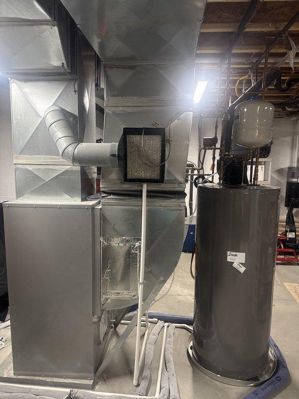 Completed comprehensive maintenance service on geothermal HVAC system including air handler unit and associated equipment. Inspected and serviced all accessible components, verified proper operation of air filtration system, checked ductwork connections, and confirmed system functionality. All equipment found operating within normal parameters with no issues identified during inspection.