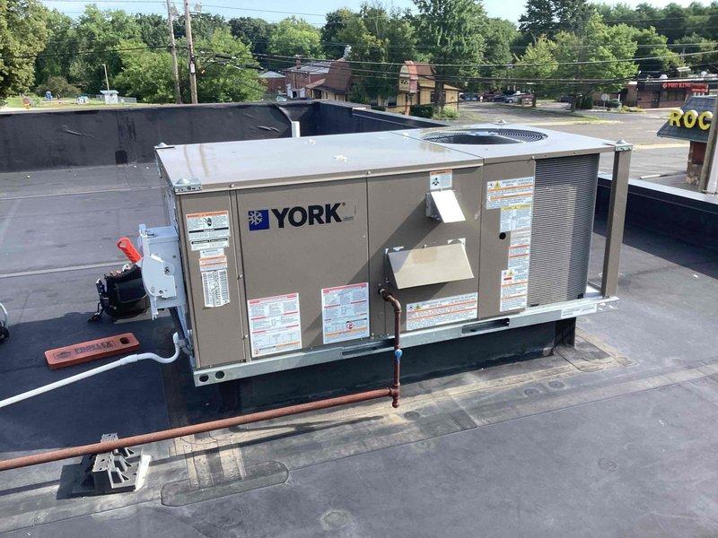 Completed scheduled commercial cooling maintenance on York rooftop package unit. Performed comprehensive system inspection, verified operational parameters, and documented equipment condition with moisture readings and visual assessment. All components found operating within normal specifications with no immediate service needs identified.