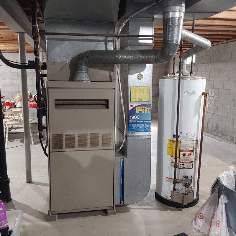 Conducted on-site assessment for complete HVAC system replacement involving existing Lennox furnace and air conditioning unit. Evaluated basement-installed furnace with current ductwork configuration and exterior condensing unit mounted on concrete pad. Documented existing equipment specifications, duct system layout, and installation conditions to provide comprehensive replacement quotation for new heating and cooling system.
