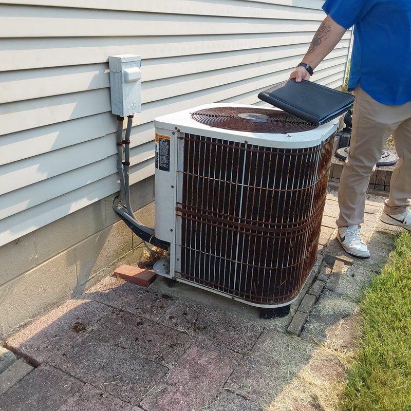 Conducted on-site assessment for complete HVAC system replacement involving existing Lennox furnace and air conditioning unit. Evaluated basement-installed furnace with current ductwork configuration and exterior condensing unit mounted on concrete pad. Documented existing equipment specifications, duct system layout, and installation conditions to provide comprehensive replacement quotation for new heating and cooling system.