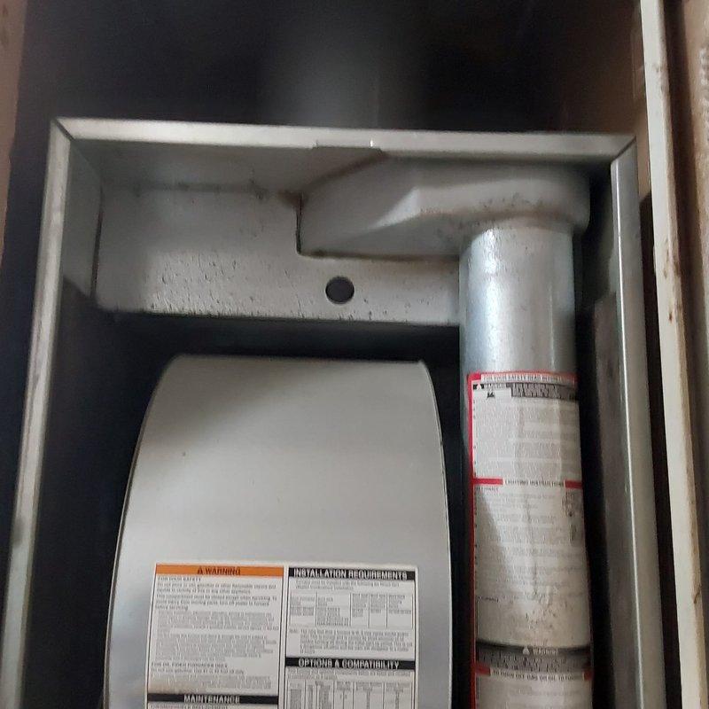 Completed comprehensive estimate for replacement of existing Rheem Performance water heater and furnace system in residential utility closet. Both units showing signs of age and wear, with visible corrosion and debris accumulation at water heater base. Documented current equipment specifications, condition, and installation parameters including clearances, venting configuration, and copper supply lines. Provided homeowner with detailed replacement options for upgrading to high-efficiency equipment that meets current code requirements and improves overall system performance.