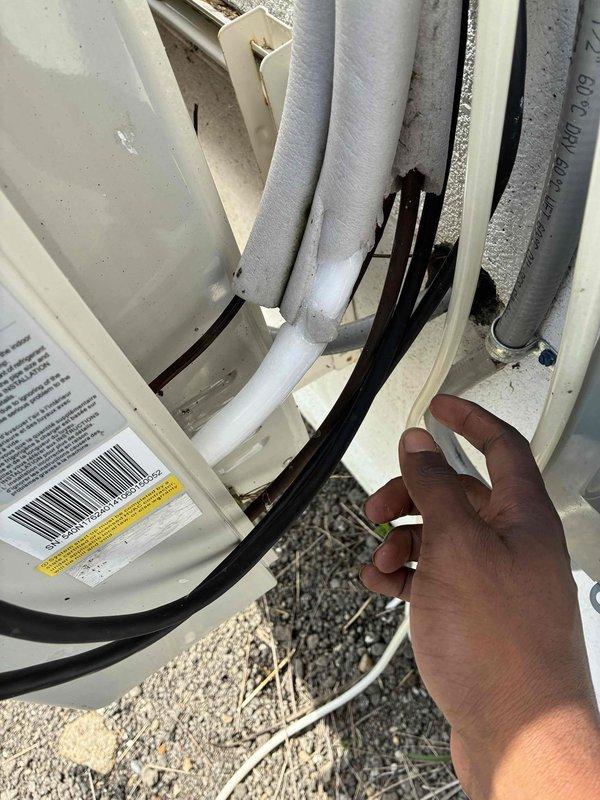 Responded to no cooling complaint on commercial mini-split system. Inspected interior components of outdoor condensing unit, including refrigerant lines, electrical connections, and disconnect panel. Verified proper electrical supply at Eaton CH-series disconnect switch and examined refrigerant line insulation for integrity. Unit inspected and assessed for cooling system functionality.