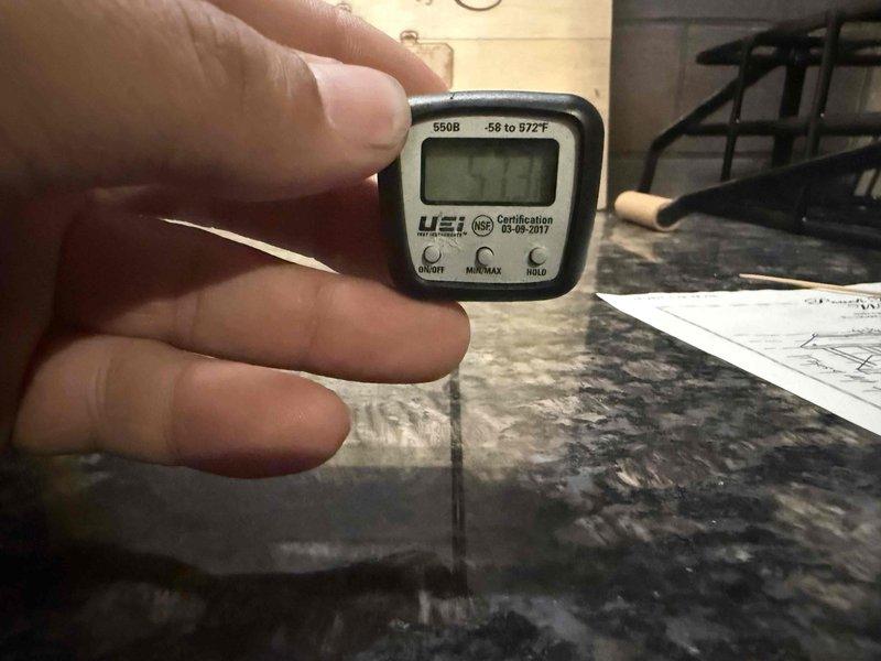 # Wine Room Mini Split Service Call

Responded to service call for 8-year-old CellarPro wine room cooling unit not maintaining proper temperature. Upon arrival, found unit operational but displaying 54°F on digital control panel. Performed diagnostic testing and temperature verification using calibrated digital thermometer, which recorded 111.1°F at the supply air outlet, confirming significant cooling deficiency. Unit showed no obvious signs of mechanical failure, with control panel illuminated and fan operation functional across all speed settings (LOW, MED, HIGH). Documented equipment condition and temperature readings via photographs for service records. Based on age of system and observed performance issues, recommended further diagnostics to determine root cause of cooling loss, which may include refrigerant charge verification, compressor function testing, or potential component failure in the refrigeration circuit.