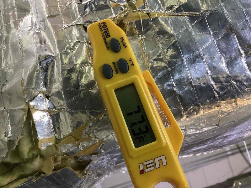 Responded to no cooling complaint on commercial air conditioning system. Upon arrival, performed diagnostic assessment of outdoor condenser unit. Conducted temperature and operational measurements using digital testing equipment. Inspected condenser unit exterior condition, electrical connections, and surrounding installation area. Identified system issues and took diagnostic readings to determine root cause of cooling failure. Unit required service attention due to operational malfunction affecting commercial space climate control.