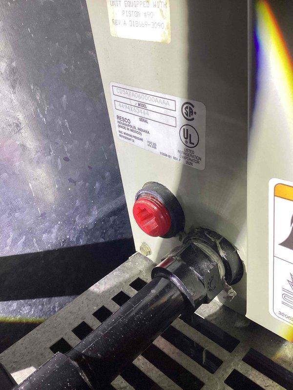 Responded to service call for commercial air conditioning system drain line issue. Upon inspection, located clogged condensate drain line causing water backup at air handler unit. Cleared blockage from drain line using appropriate tools and verified proper drainage flow. Tested system operation to confirm condensate removal functioning correctly and no further leaks present.