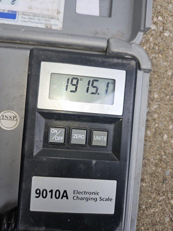 Completed maintenance service on 10-year-old air conditioning unit. Performed system diagnostics and utilized electronic charging scale to verify refrigerant levels and pressures were within manufacturer specifications. All measurements confirmed proper system operation and charge levels maintained at optimal parameters for continued efficient cooling performance.