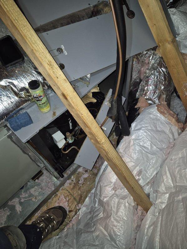 Responded to no cooling complaint in upstairs zone following recent service visit. Inspected attic-mounted air handler and associated refrigerant lines, ductwork, and insulation installation. Verified system operation and ensured all components were properly secured and functioning to restore cooling to affected area.
