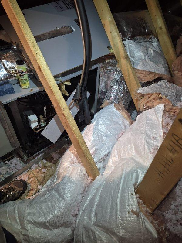 Responded to no cooling complaint in upstairs zone following recent service visit. Inspected attic-mounted air handler and associated refrigerant lines, ductwork, and insulation installation. Verified system operation and ensured all components were properly secured and functioning to restore cooling to affected area.