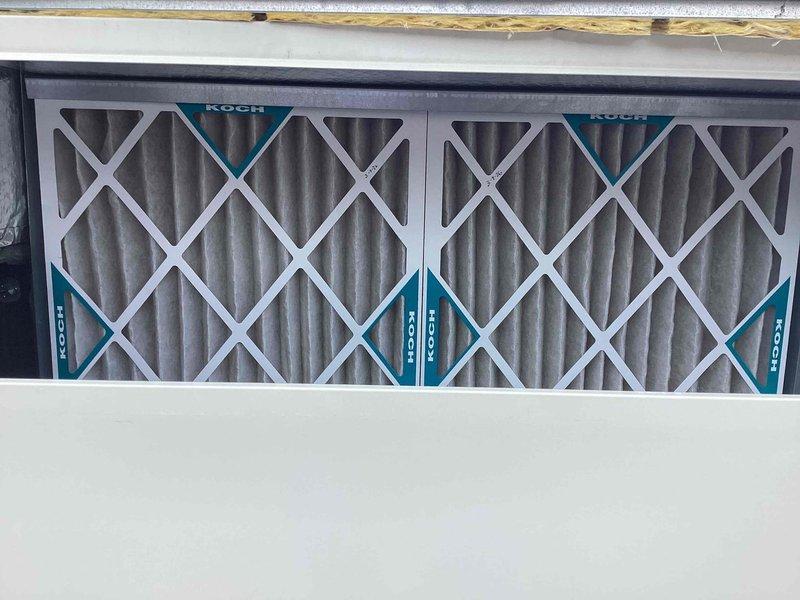 Completed scheduled commercial cooling maintenance on Daikin rooftop unit. Inspected RTU operation and components, replaced three KOCH brand pleated air filters in the air handling system, and verified proper airflow and system performance. All equipment operating within normal parameters at time of service.