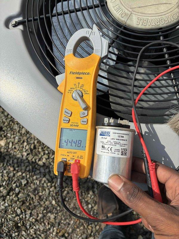 Performed scheduled commercial cooling maintenance on rooftop HVAC unit. Conducted electrical diagnostics using digital multimeter to test capacitor performance and verify proper voltage readings. Measured capacitor microfarad values to ensure component was operating within manufacturer specifications. All readings confirmed system components functioning correctly with no deficiencies noted.