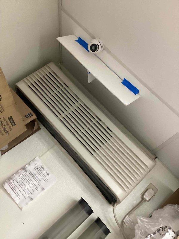 Responded to service call for commercial A/C unit not maintaining setpoint temperature, with thermostat set to 75°F but space reading 84°F. Upon arrival, inspected Amana PTAC unit and assessed system performance. Documented equipment condition and installation setup, noting unit mounted in corner location with visible refrigerant lines and electrical connections. System appears to require further diagnostics to determine cause of insufficient cooling capacity and temperature differential issue.