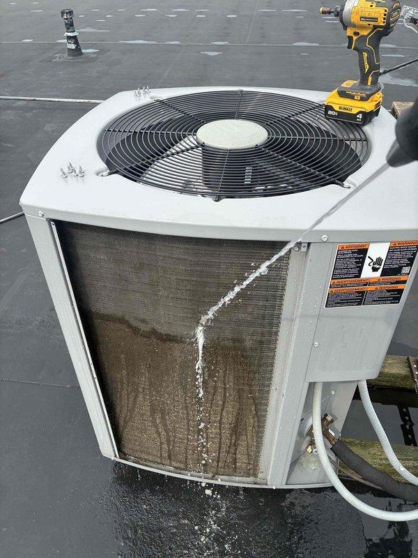 Completed routine commercial cooling maintenance on rooftop condensing unit. Performed standard service procedures including cleaning condenser coils with water flush, inspecting fan motor and blade assembly, and checking refrigerant operation. Accessed air handler compartment and noted filter condition and interior cleanliness. All components operating within normal parameters upon completion of scheduled maintenance visit.